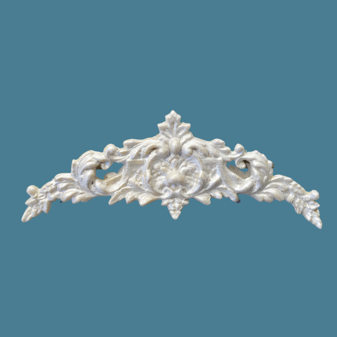 P15 French Style Pediment, an arched Efex flexible moulding crest with a peaked acanthus finial, central flower and trailing leafy garlands