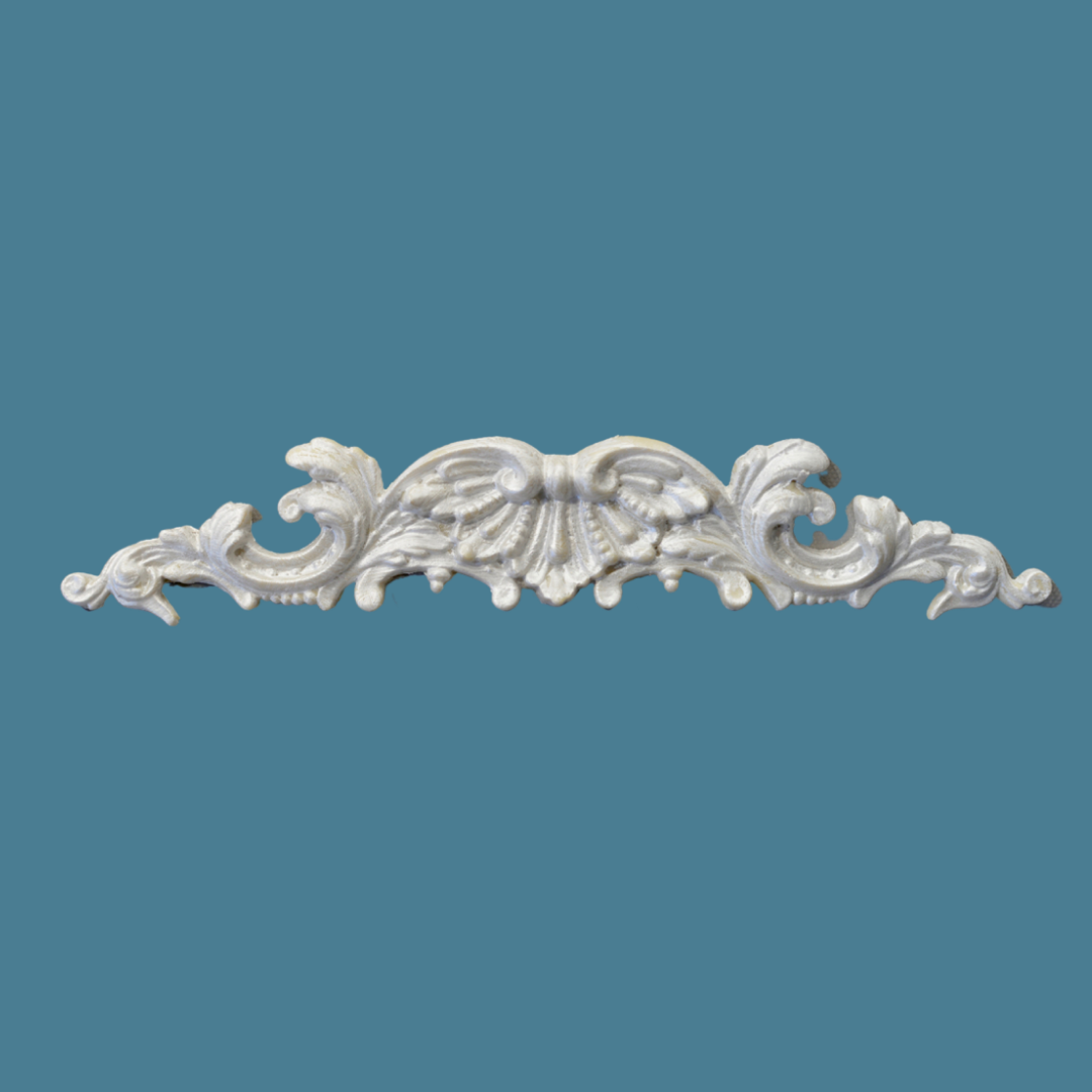 P16 French Style Pediment, a long low Efex flexible moulding crest with a central shell and flowers flanked by curling acanthus scrolls