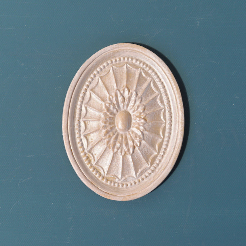 R14 Adam Rosette, an oval Efex flexible moulding medallion with a sunburst of fluted rays, central flower and beaded rim