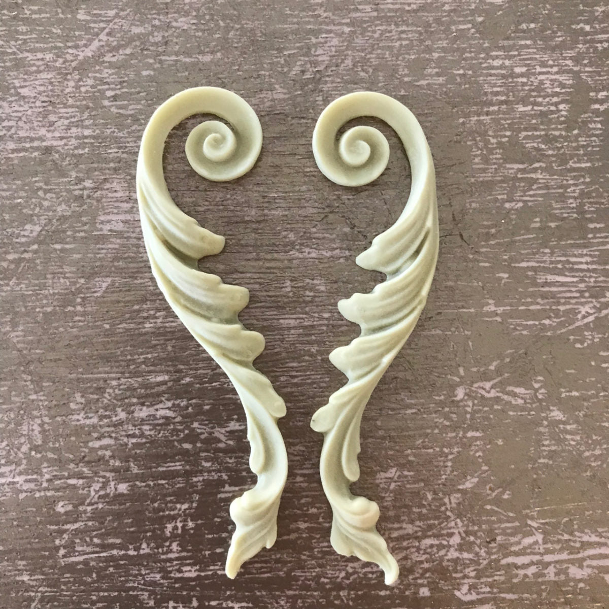 SC16 French Empire Scrolls, a mirrored pair of slender Efex flexible moulding acanthus scrolls with spiral tops and layered leaves