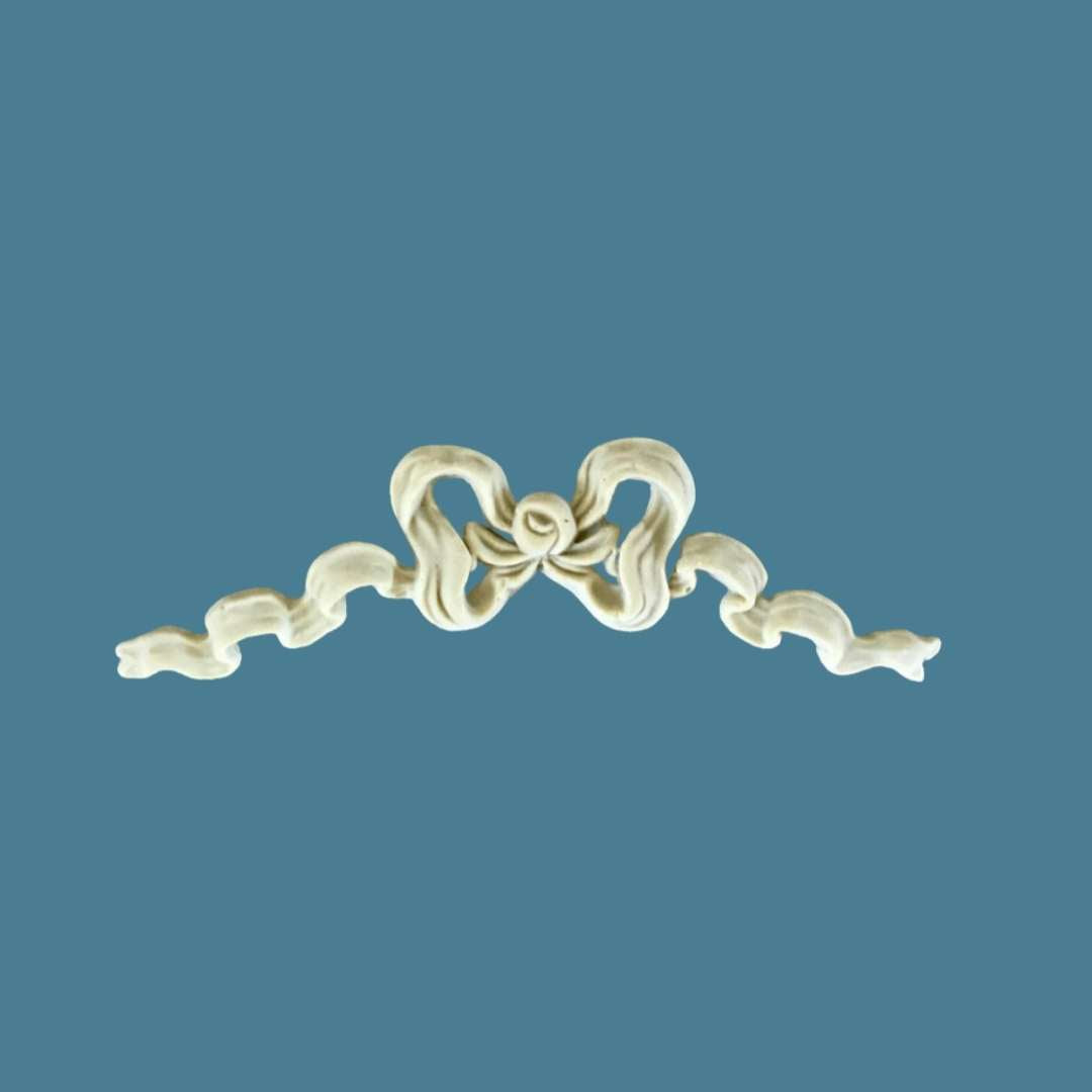 B14 Ribbed Bow, an Efex flexible moulding ribbon bow with ribbed loops and long wavy tails