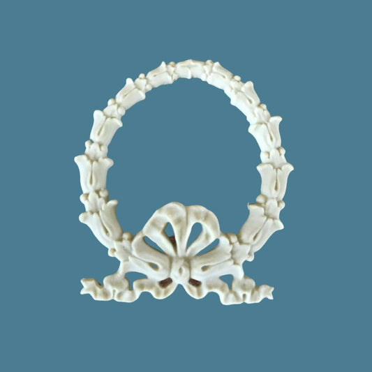 B21 Leaf Wreath Bow, an Efex flexible moulding oval wreath of small leaves tied at the base with a ribbon bow
