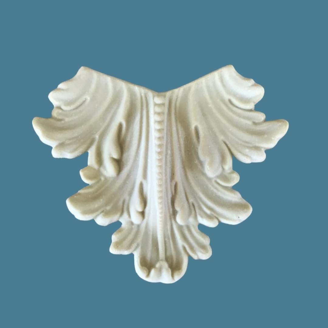 L4 Acanthus and Bead Leg, an Efex flexible moulding applique of spreading acanthus leaves with a beaded centre spine, for furniture legs and corbels