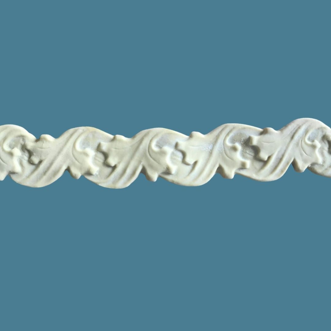 T20 Scandinavian Trim, Efex flexible moulding with a rolling wave of carved leaves in a folk-inspired Scandinavian style