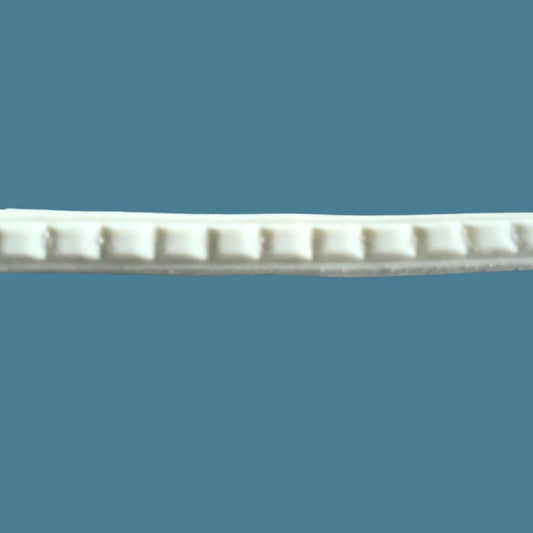 T50 Small Dentil Trim, Efex flexible moulding with a row of evenly spaced square dentil blocks along a slim base